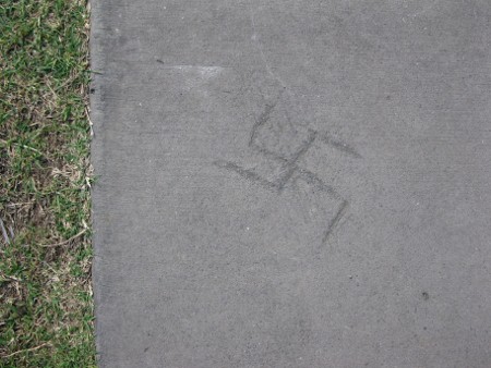swastika in the sidewalk